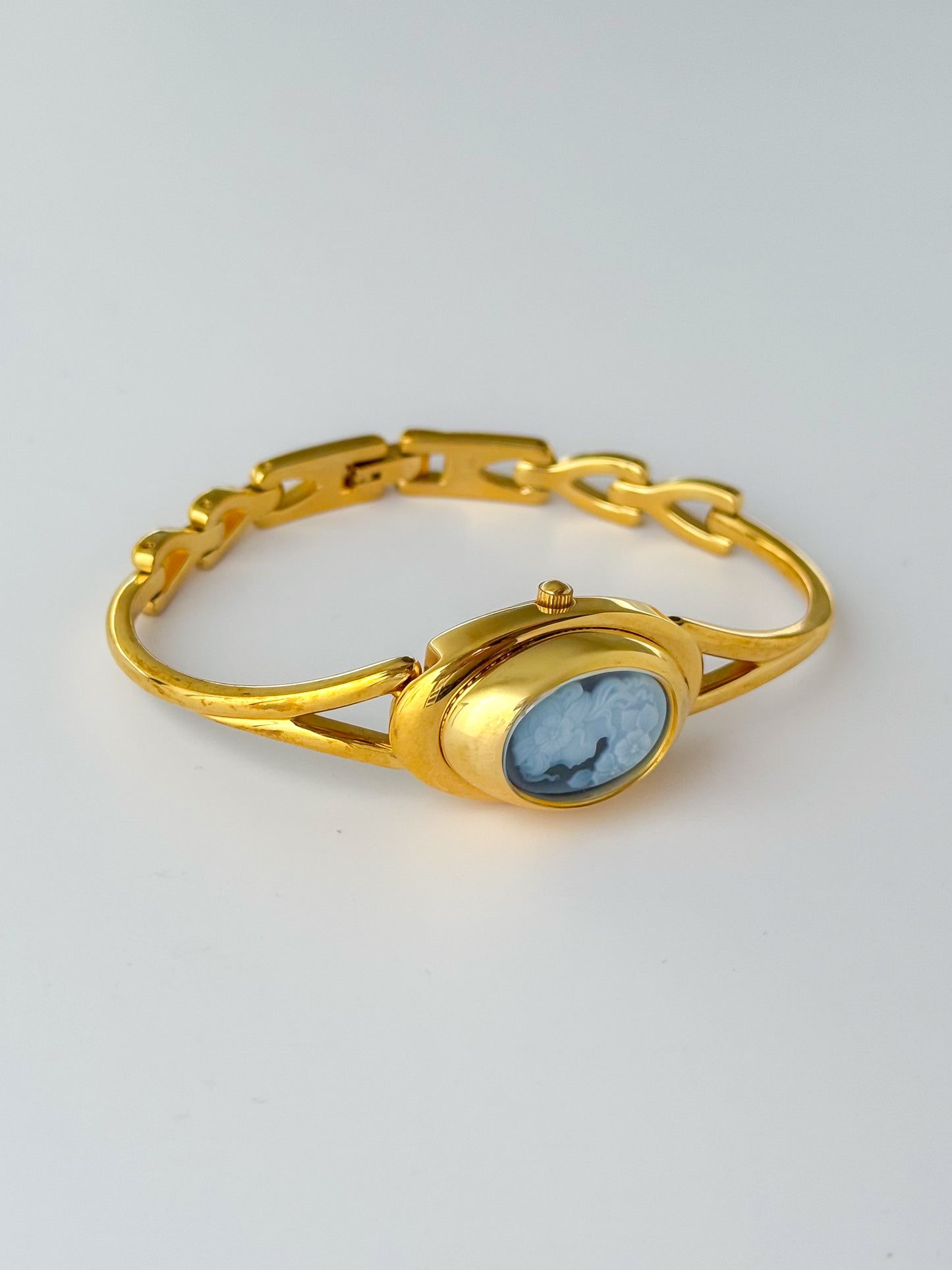Rare Vintage Gold Tone Bangle Watch With A Blue Cameo Peekaboo Dial