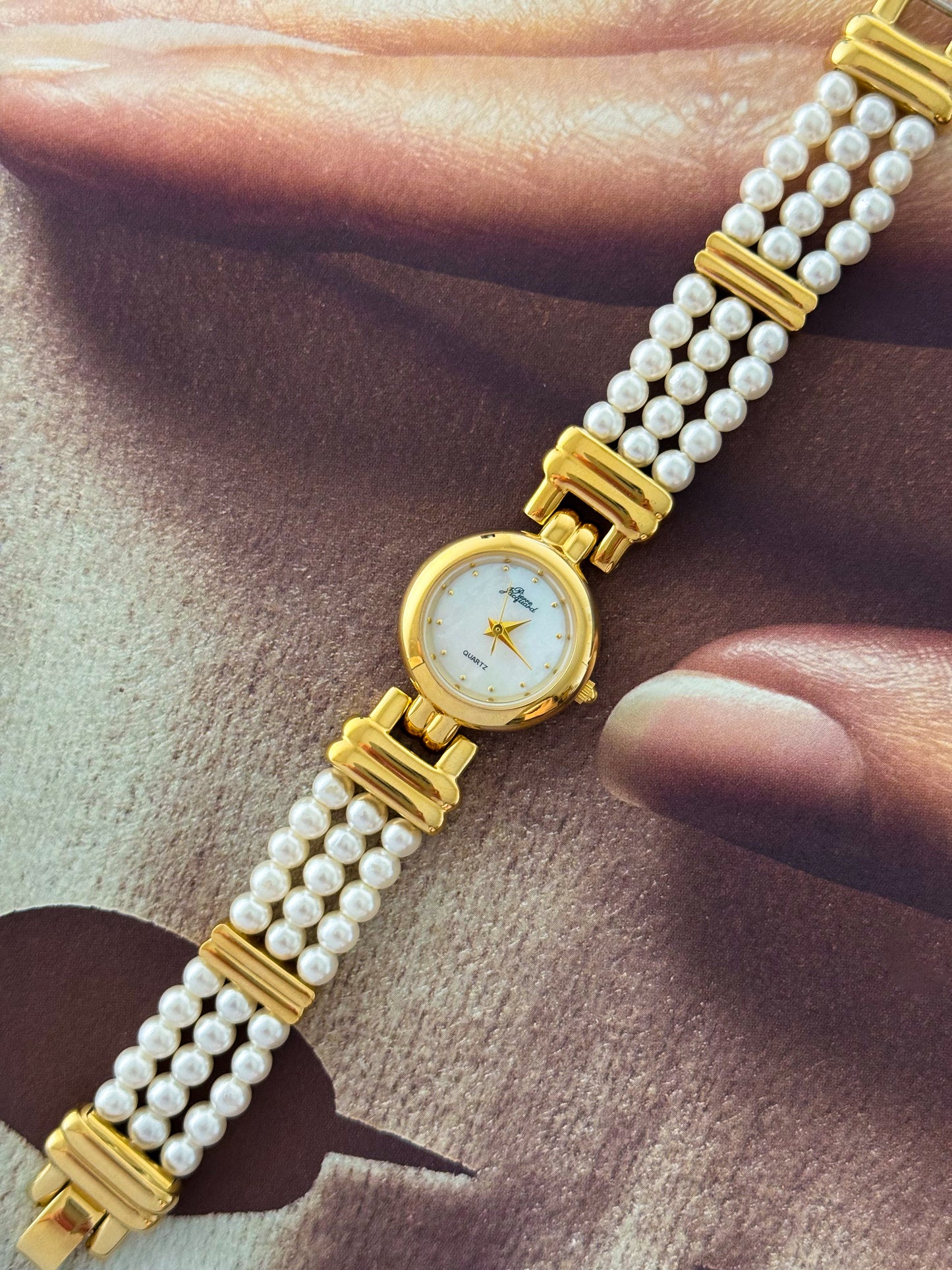 Vintage Pierre Jacquard Gold Watch With Pearl Band and Round Mother Of Pearl Case