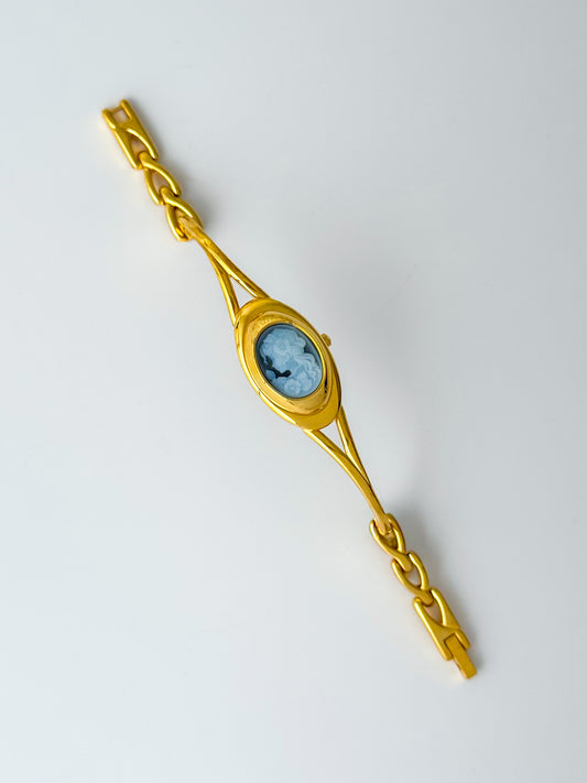 Rare Vintage Gold Tone Bangle Watch With A Blue Cameo Peekaboo Dial