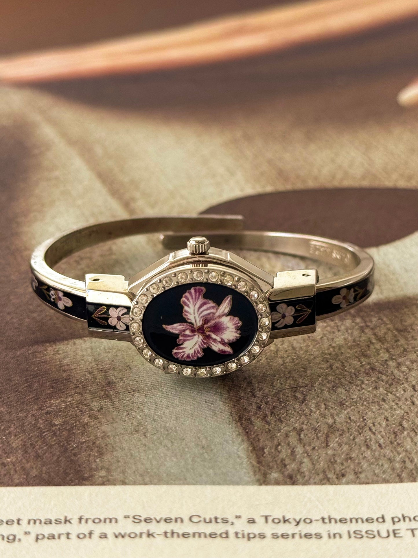 Vintage Silver Tone André Mouche Peekaboo Cuff Watch With a Black Enamel Purple Hibiscus Flower Design and Crystal Bezel