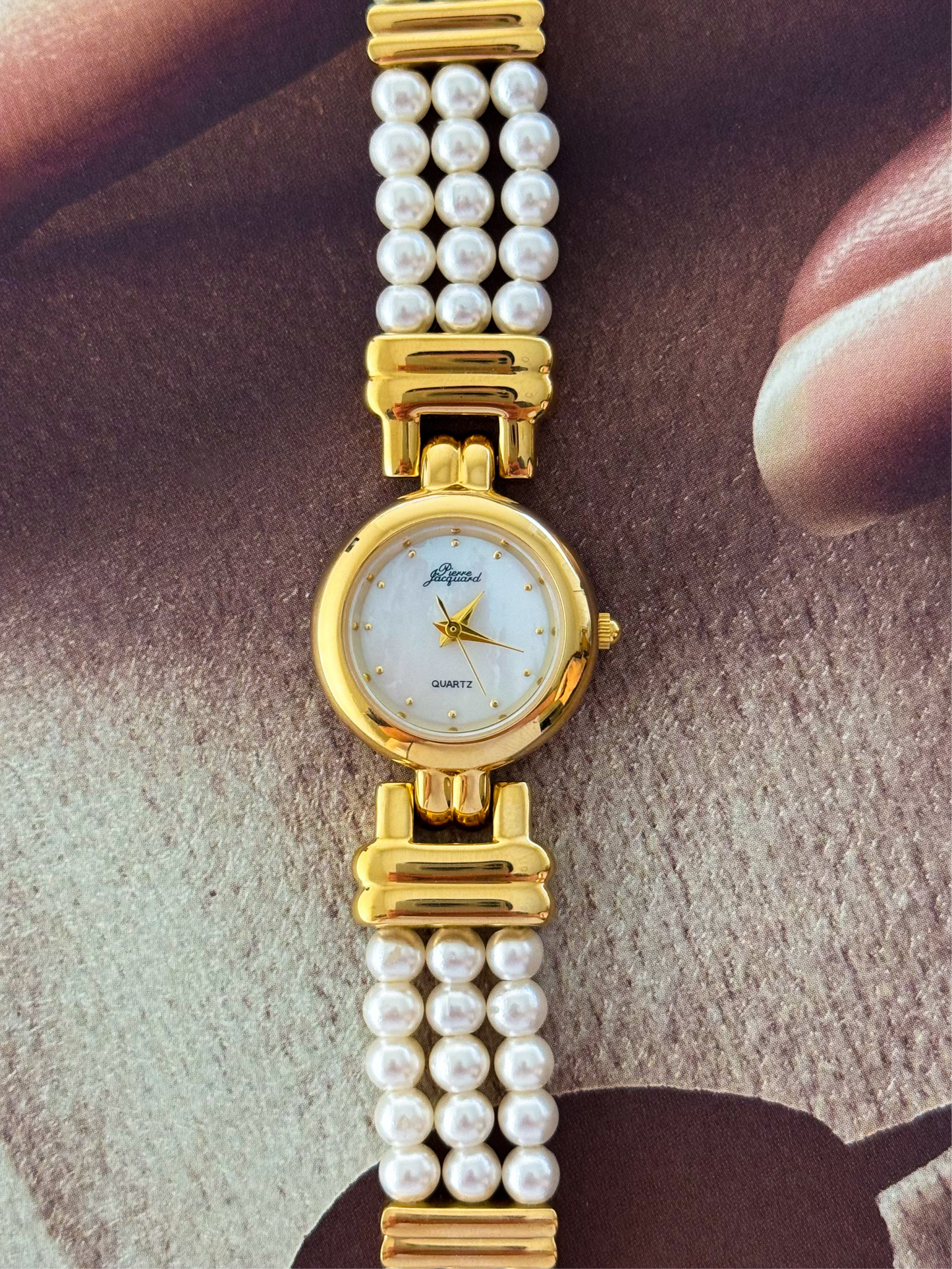 Vintage Pierre Jacquard Gold Watch With Pearl Band and Round Mother Of Pearl Case