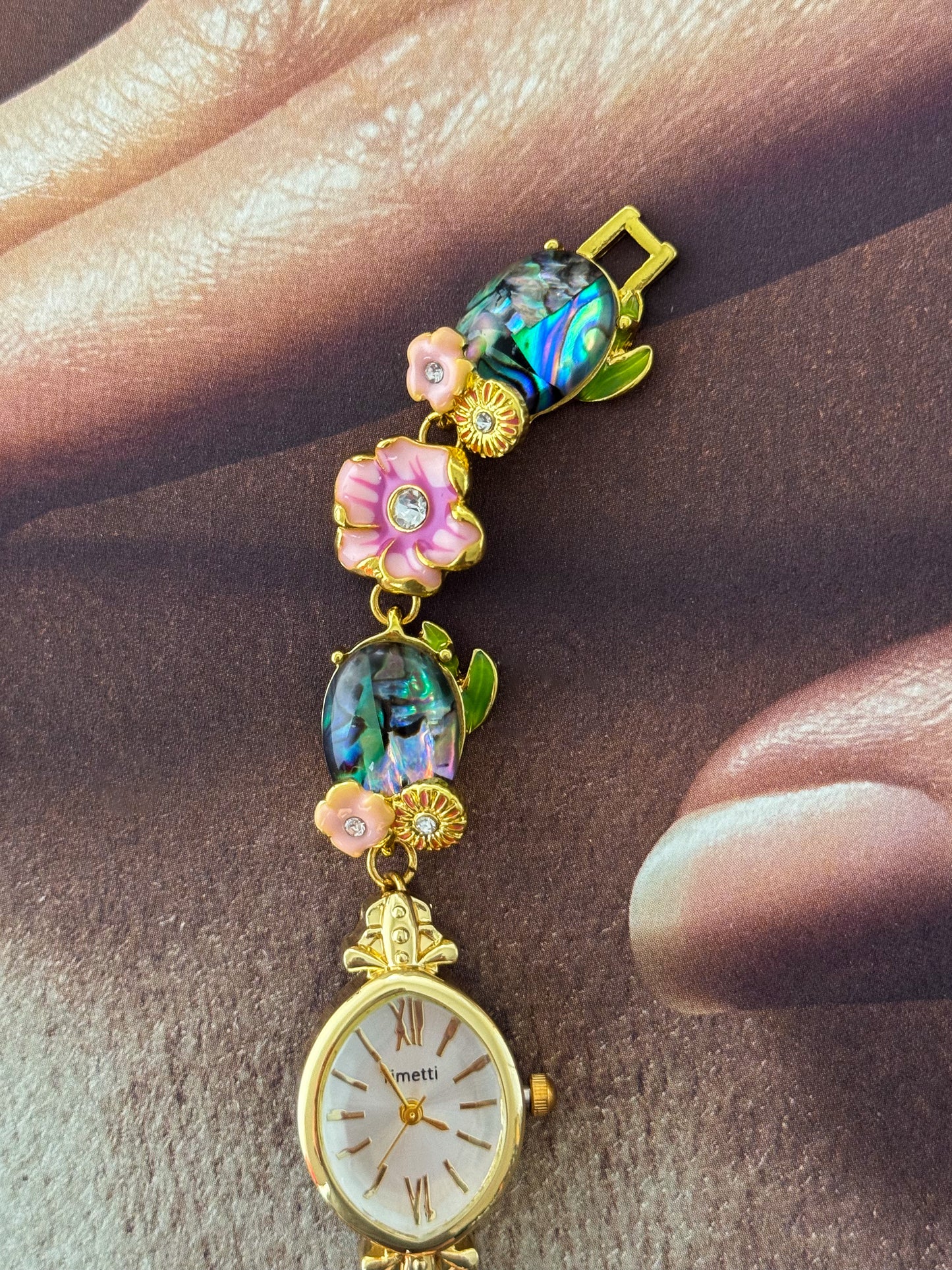 Gold Tone Watch With Colorful Abalone and Pink Flower Charm Band