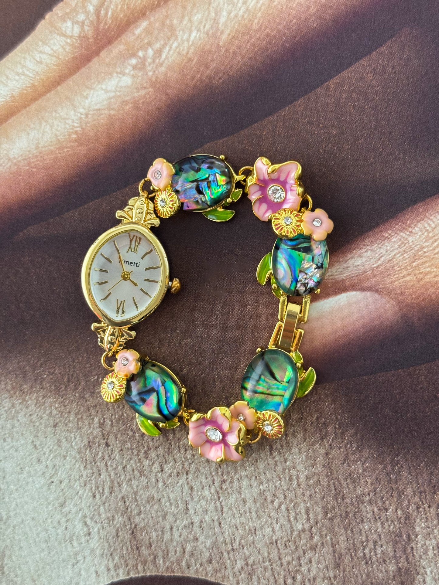 Gold Tone Watch With Colorful Abalone and Pink Flower Charm Band