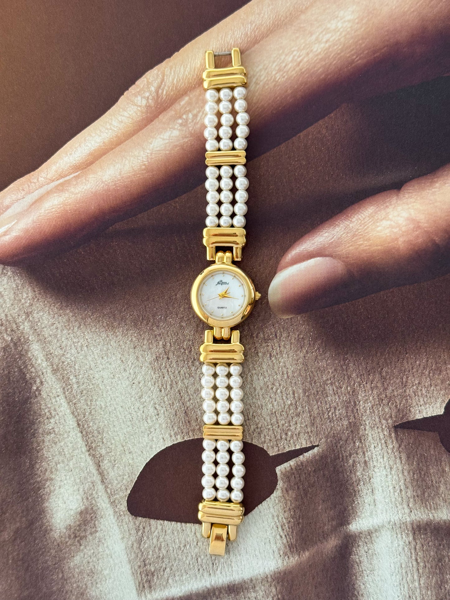 Vintage Pierre Jacquard Gold Watch With Pearl Band and Round Mother Of Pearl Case