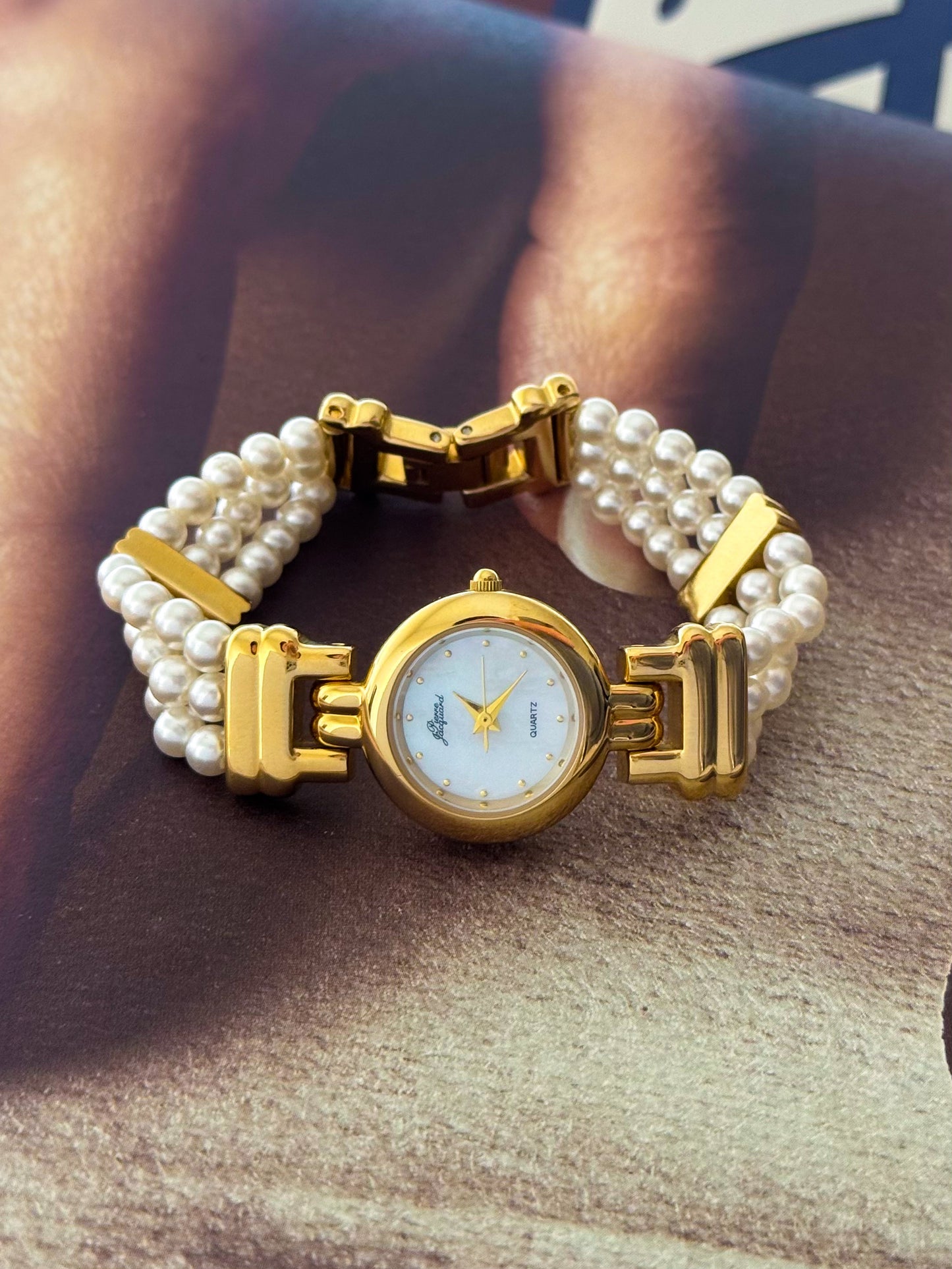 Vintage Pierre Jacquard Gold Watch With Pearl Band and Round Mother Of Pearl Case