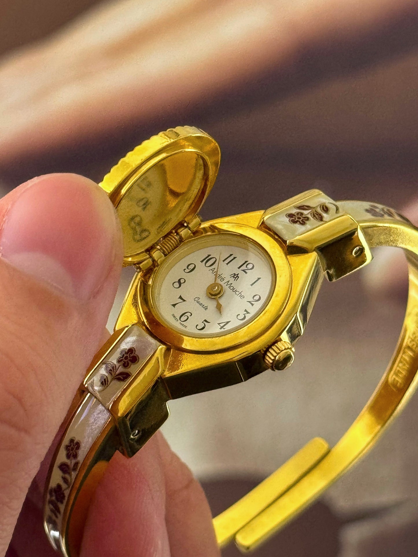 Vintage Gold Tone Andre Mouche Peekaboo Cuff Watch With a Red Peony Enamel Flower Design
