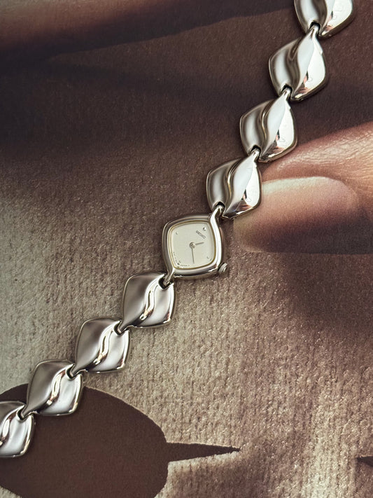 Vintage Silver Seiko Watch With Diamond Shaped Case and Polished Band