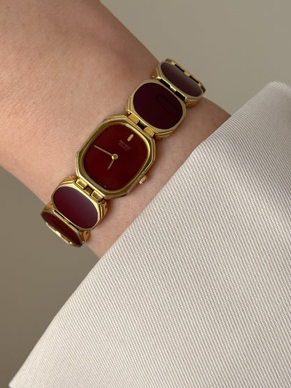 Extremely Rare and Gorgeous Seiko Watch With Deep Burgundy Tone Enamel and Gold Accents.