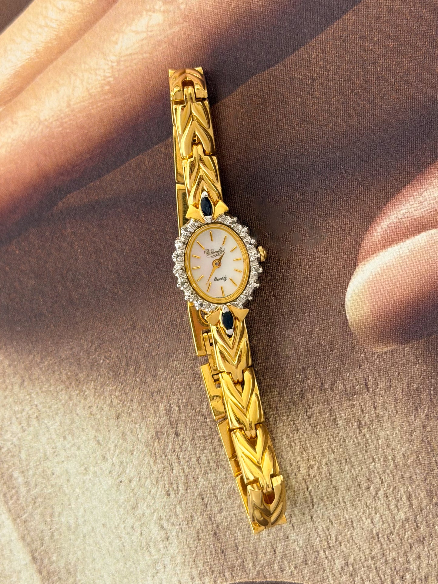 Vintage Gold Watch With Blue Gemstones and Diamond Accent