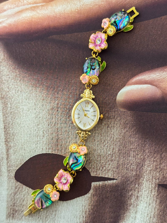 Gold Tone Watch With Colorful Abalone and Pink Flower Charm Band