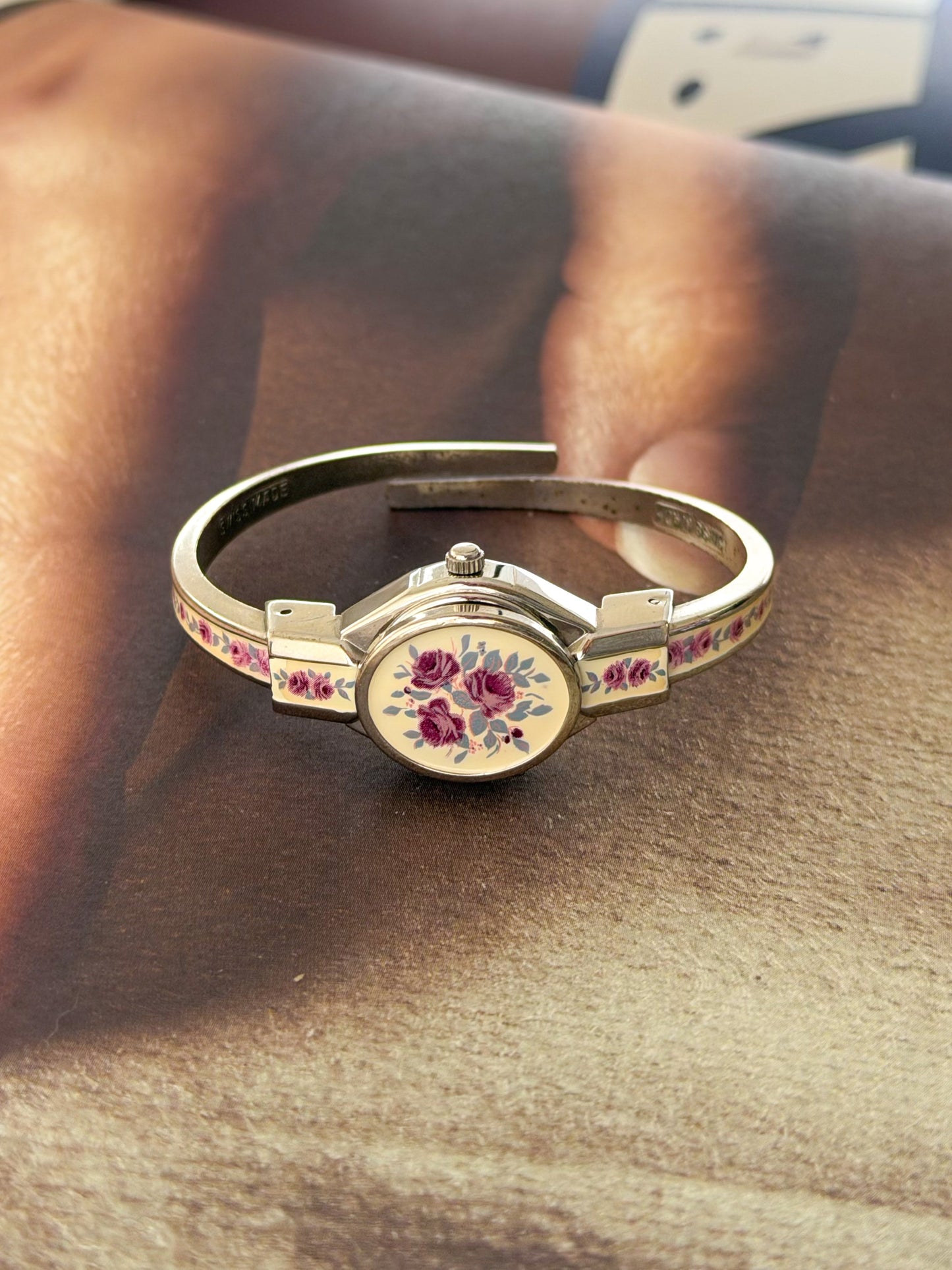 Vintage Silver Tone André Mouche Peekaboo Cuff Watch With White Enamel and Pink Rose Design