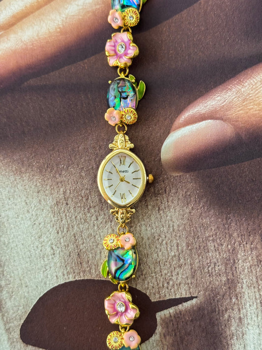 Gold Tone Watch With Colorful Abalone and Pink Flower Charm Band