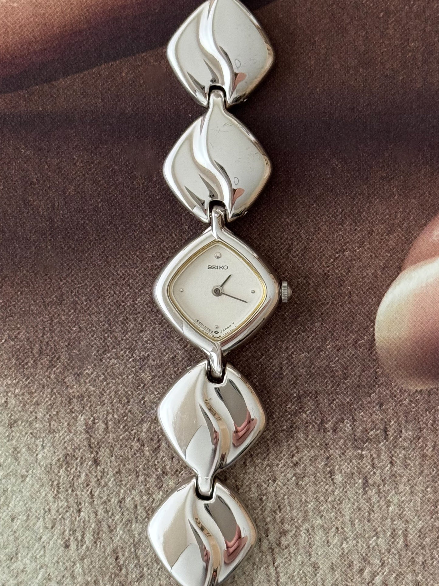 Vintage Silver Seiko Watch With Diamond Shaped Case and Polished Band