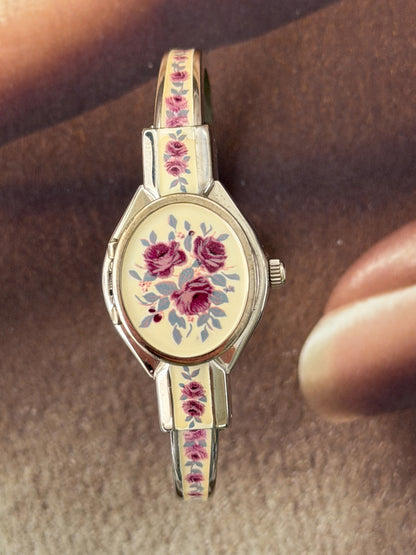 Vintage Silver Tone André Mouche Peekaboo Cuff Watch With White Enamel and Pink Rose Design