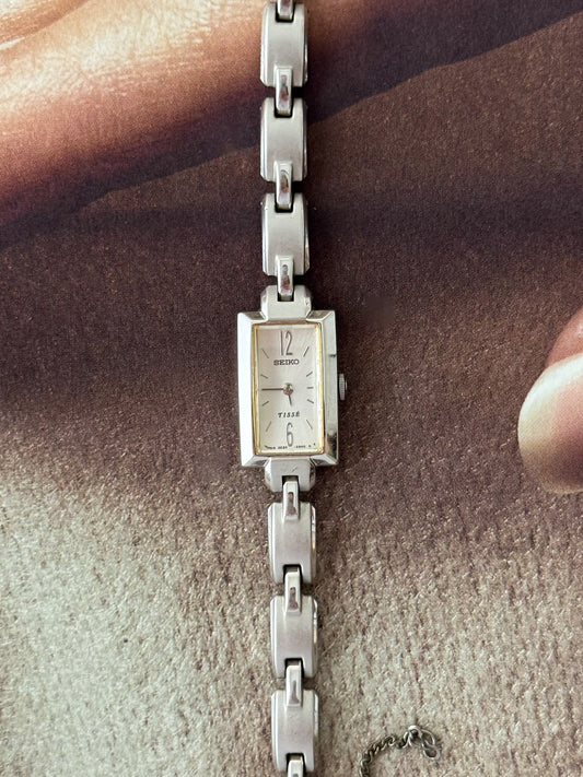 Vintage Silver Seiko Tisse Watch With Rectangle Face and Band
