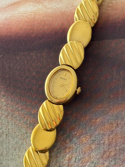 Dainty 1990s Gold Plated Seiko Watch with Petite Oval Dial