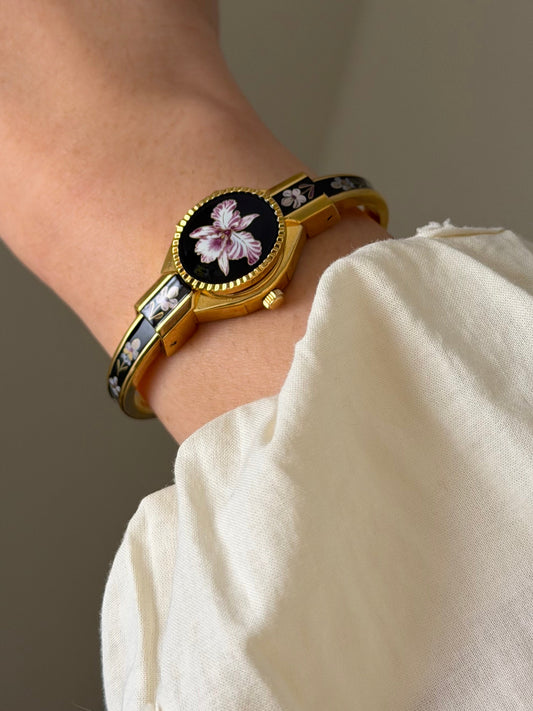 Vintage Gold Tone Andre Mouche Peekaboo Cuff Watch With Black and Purple Peony Enamel Flower Design