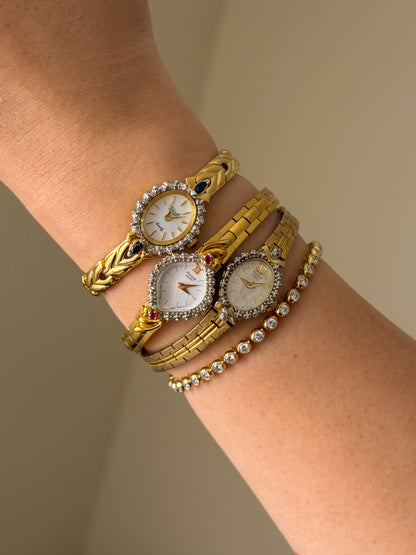 Vintage Gold Watch With Blue Gemstones and Diamond Accent