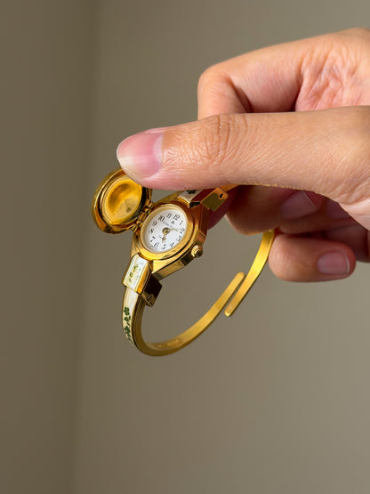 Vintage Gold Tone Andre Mouche Peekaboo Cuff Watch With a Green Peony Enamel Flower Design