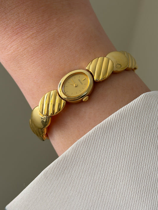 Dainty 1990s Gold Plated Seiko Watch with Petite Oval Dial