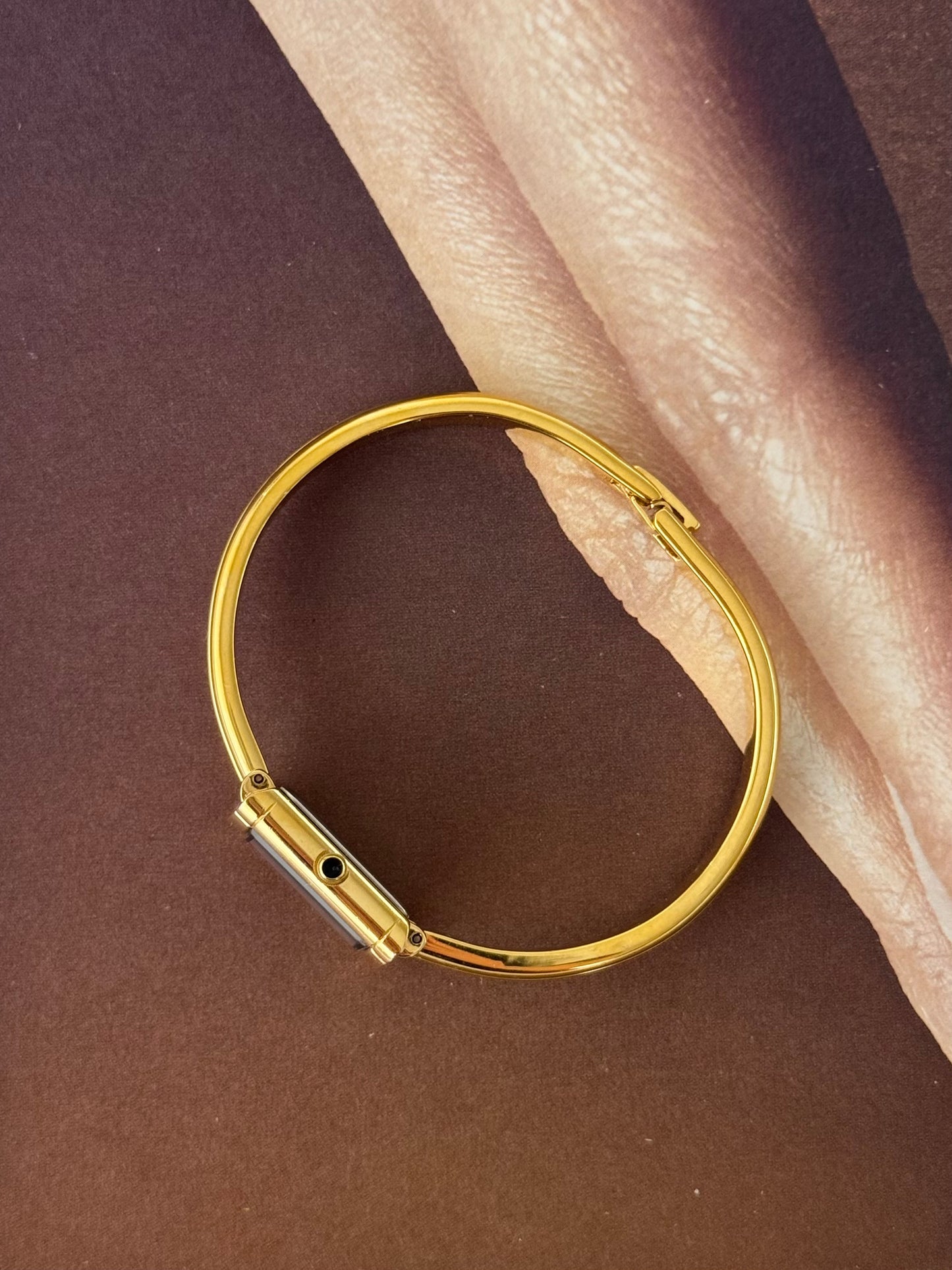 Vintage 90s Gold Tone Yves Saint Laurent (YSL) Bangle Watch With Blue Square Dial