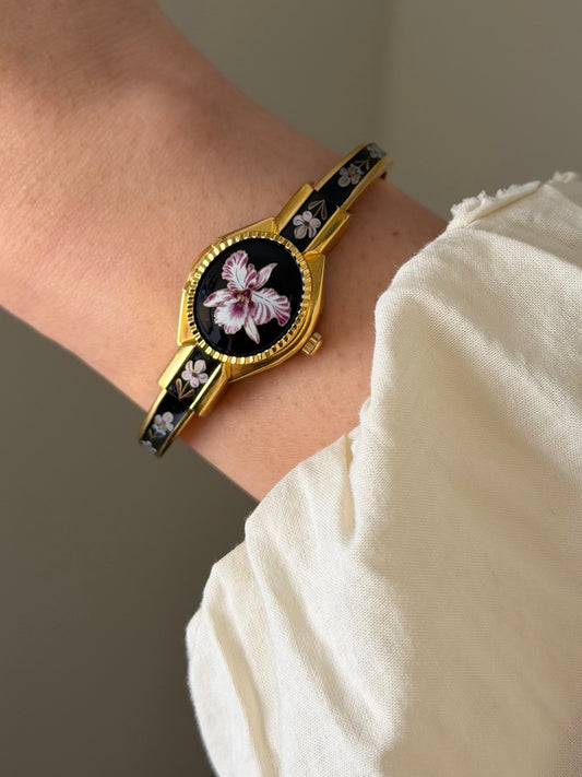 Vintage Gold Tone Andre Mouche Peekaboo Cuff Watch With Black and Purple Peony Enamel Flower Design
