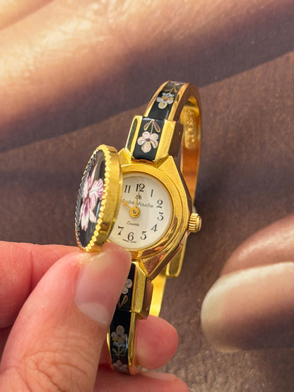 Vintage Gold Tone Andre Mouche Peekaboo Cuff Watch With Black and Purple Peony Enamel Flower Design