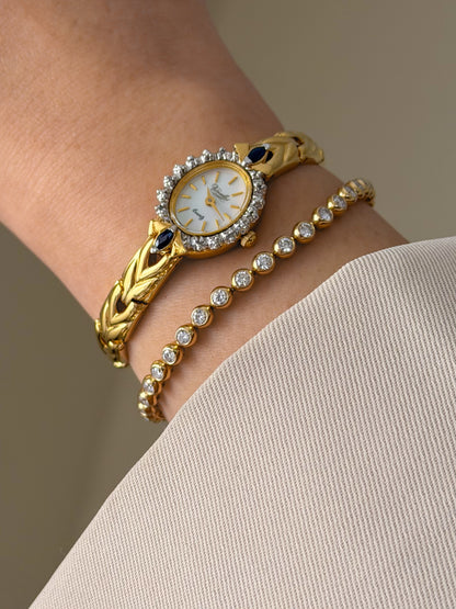 Vintage Gold Watch With Blue Gemstones and Diamond Accent