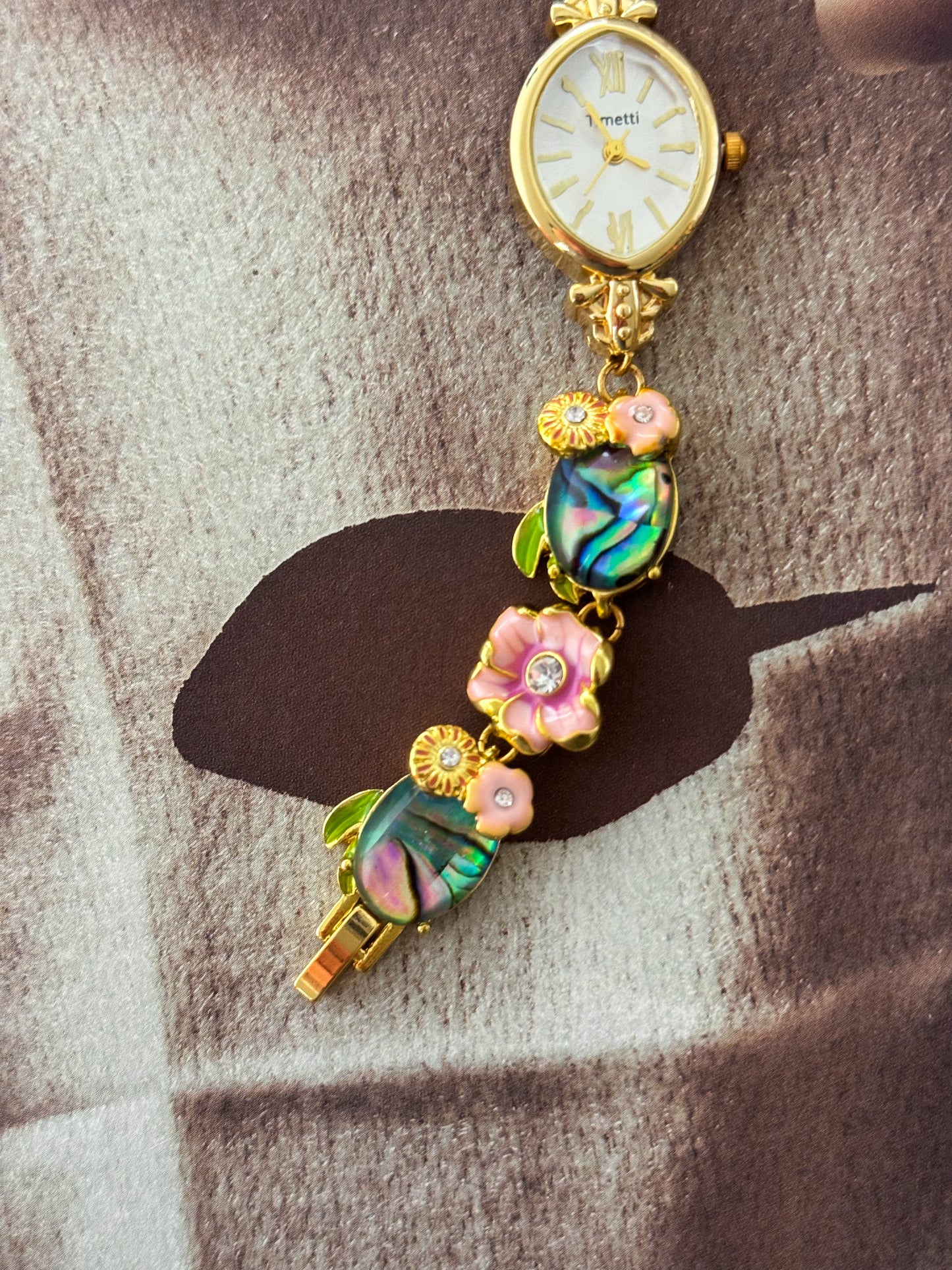 Gold Tone Watch With Colorful Abalone and Pink Flower Charm Band