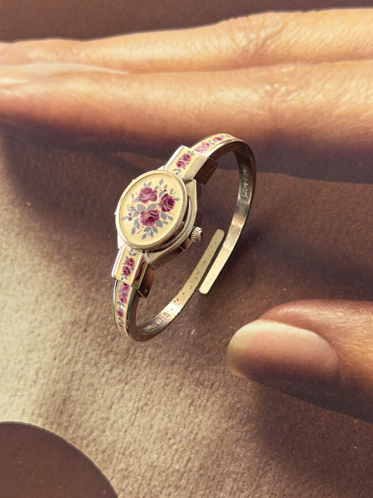 Vintage Silver Tone André Mouche Peekaboo Cuff Watch With White Enamel and Pink Rose Design