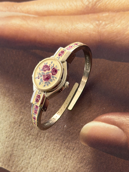Vintage Silver Tone André Mouche Peekaboo Cuff Watch With White Enamel and Pink Rose Design