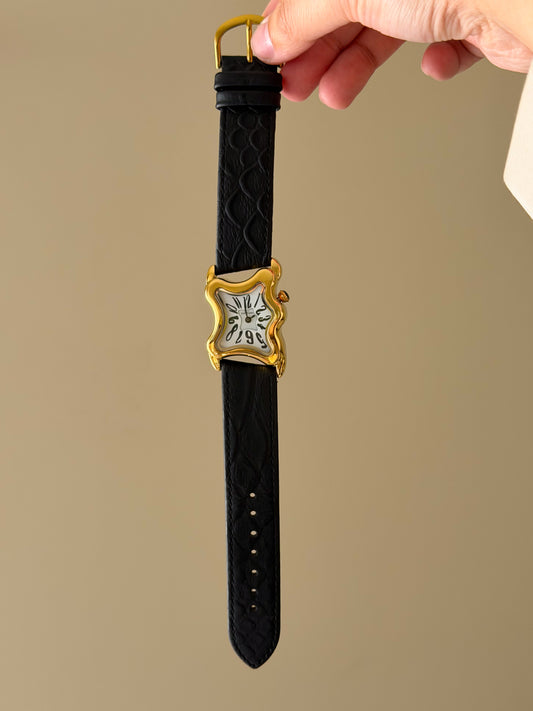 Surrealist Watch With Melting Wavy Gold Dial and Black Leather Band