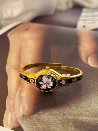 Vintage Gold Tone Andre Mouche Peekaboo Cuff Watch With Black and Purple Peony Enamel Flower Design