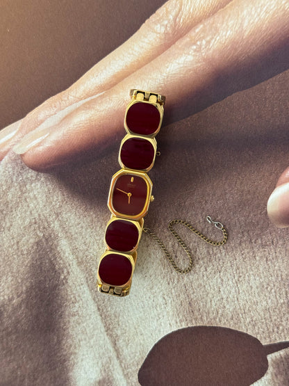 Extremely Rare and Gorgeous Seiko Watch With Deep Burgundy Tone Enamel and Gold Accents.